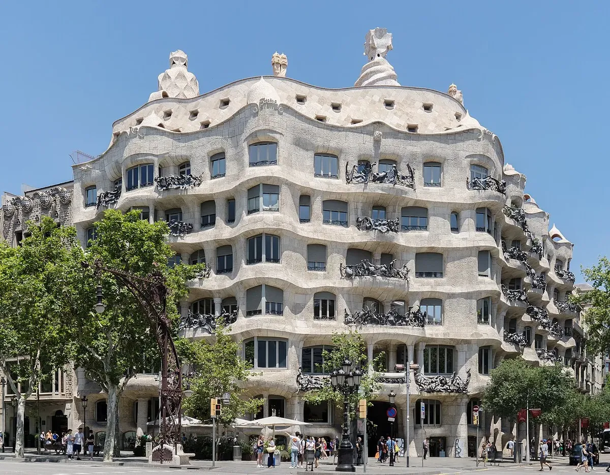 The wavy stone façade of Casa Milà on the corner of Passeig de Gràcia and Carrer de Provença