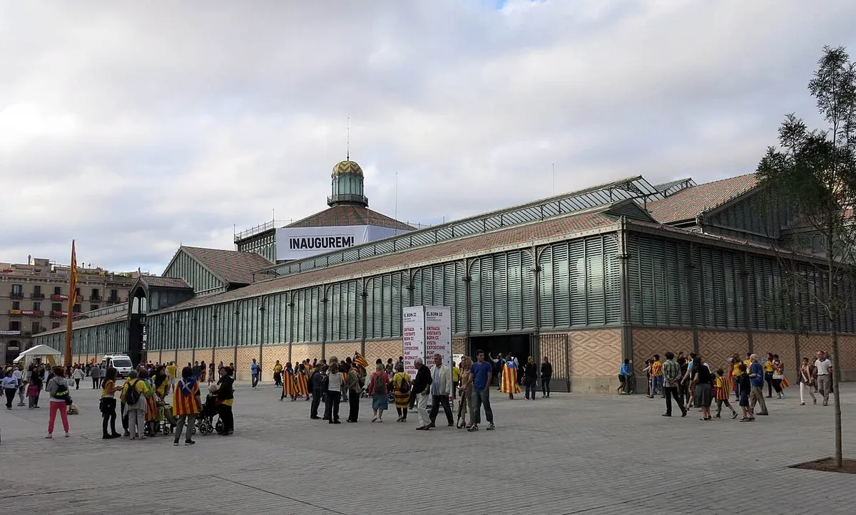 The long iron and glass hall of the Mercat del Born with its central lantern