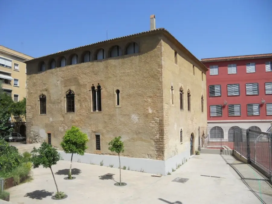 Torre Llobeta, a stone manor house with Gothic windows, now a civic centre
