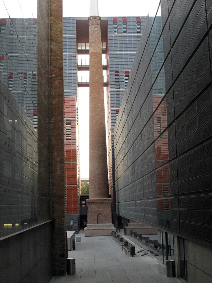 The tapering brick chimney of Ca l'Aranyó on the Pompeu Fabra University campus